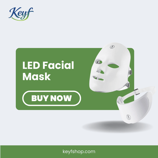 White LED facial mask with green label and 'Keyf' branding on a light gray background.
