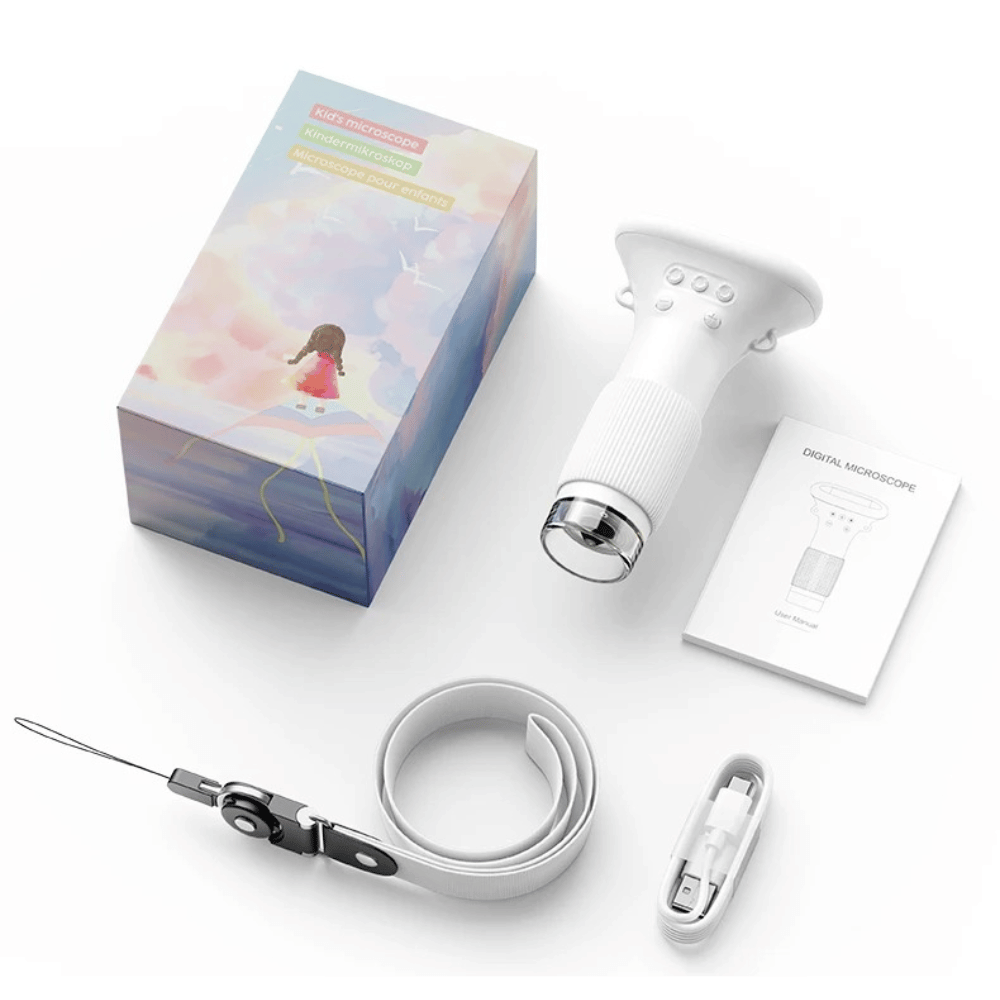 Digital microscope with accessories and packaging on a white background
