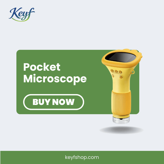 Yellow pocket microscope with green banner and 'Keyf' branding on a light gray background